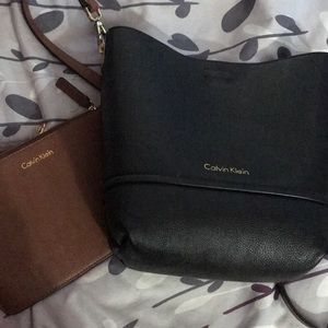 Calvin Klein, black or brown reversible purse.